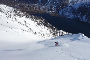 Beast from the East, Sgòr Gaoith and Sgòran Dubh Mòr: Philip Ebert setting off from the ridge bordering Katabatic Couloir in 2018 Photo: Scott Muir