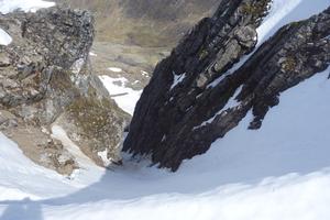 Number 2 Gully, Ben Nevis: Looking down Number 2 Gully, late May 2016.  The debris at the narrows, and runnels can make a descent unpleasant at this time of year. Photo: Scott Muir