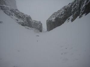 Number 5 Gully, Ben Nevis: Looking down through the narrrows below the upper snowfield. Photo: Chad Harrison