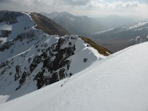 East Face / Right Gully, Sgùrr an Lochain, Kintail: Dave Anderson setting off down the East Face Photo: Scott Muir