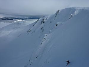 Red Spout, Lochnagar: North-East Corrie: Getting the first turn in after the steep entry Photo: Scott Muir