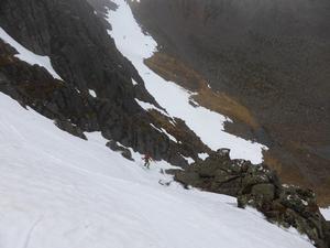 The Runnel, Cairngorm: Coire an t-Sneachda: Making for the break in the rocks to gain entry to the main gully line, May 2014 Photo: Scott Muir