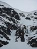 Central Gully from below, showing the entry point above the arete, and the easy alternative to the narrow section.  Photo: Scott Muir