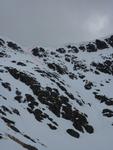 The obvious line, starting above the rocky ridge that offers a break in the cornice.  Photo: Scott Muir