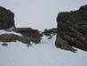 Looking back up through the gap in the rock walls from the terrace of Central Buttress Gully  Photo: Scott Muir