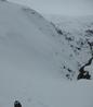 At the top of D Gully.  The alternative corniced shallow gully line is visible beyond.  Photo: Scott Muir