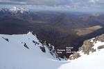 Looking down the upper section of Summit Gully to the bend.  Note the snow arete giving access to Pinnacle Gully  Photo: Scott Muir